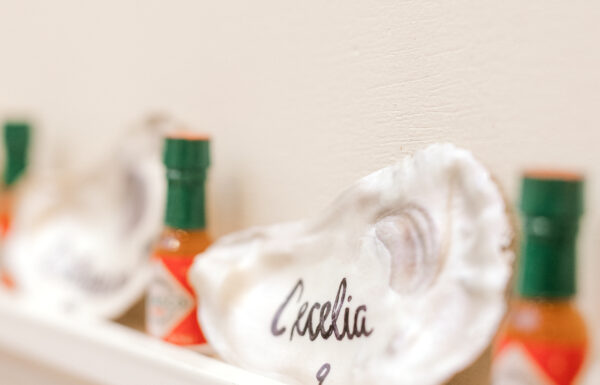A Coastal Wedding Featuring an Oyster Shell Seating Chart