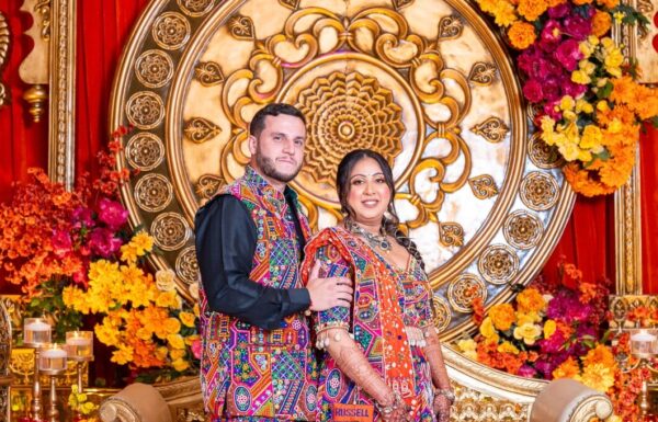 A Lavish Hindu Wedding with Vibrant Florals & Acrobatic Performers