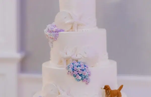 A Waterfront Wedding Featuring The Couple’s Dog & Pride Flags at the Ceremony