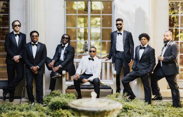 A Timeless Black and White Palette Plus Entertainers on Stilts at This Wedding