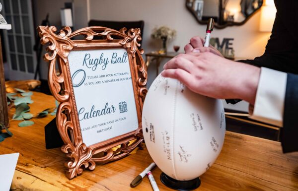 These Brides Celebrated Their Love of Rugby at Their Running Deer Golf Club Wedding