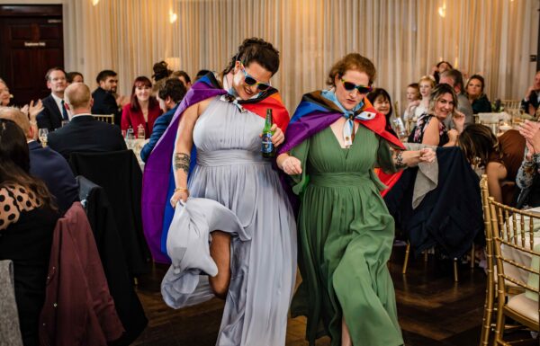 These Brides Celebrated Their Love of Rugby at Their Running Deer Golf Club Wedding