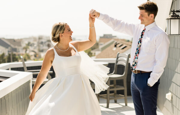 This Couple Ate Pizza on the Boardwalk In Their Wedding Outfits
