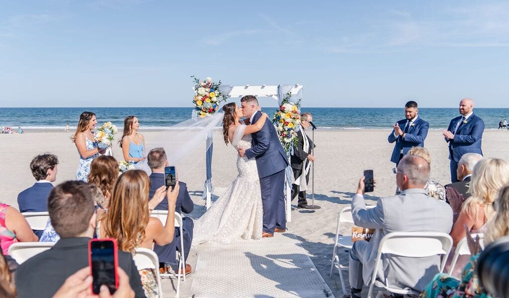 Colorful Florals And a Beautiful Beach Ceremony at This Shore Wedding