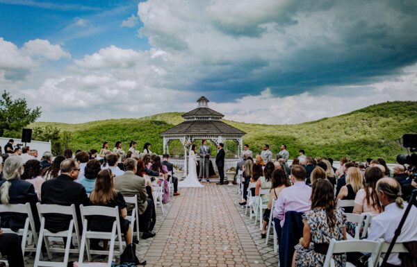 Their First Look Was on a Red Bridge Surrounded by Cherry Blossoms at The Views at Mt Fuji