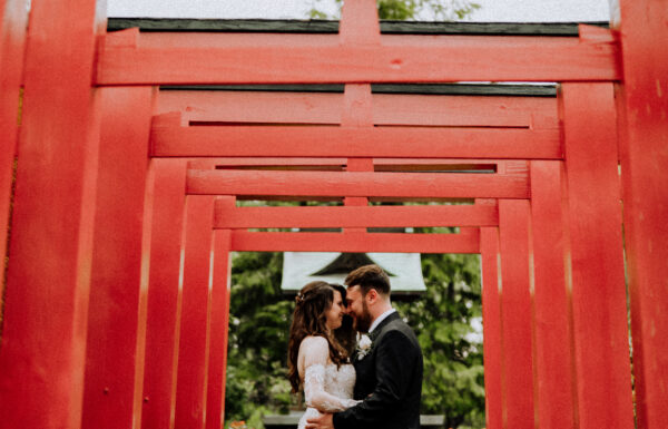 Their First Look Was on a Red Bridge Surrounded by Cherry Blossoms at The Views at Mt Fuji