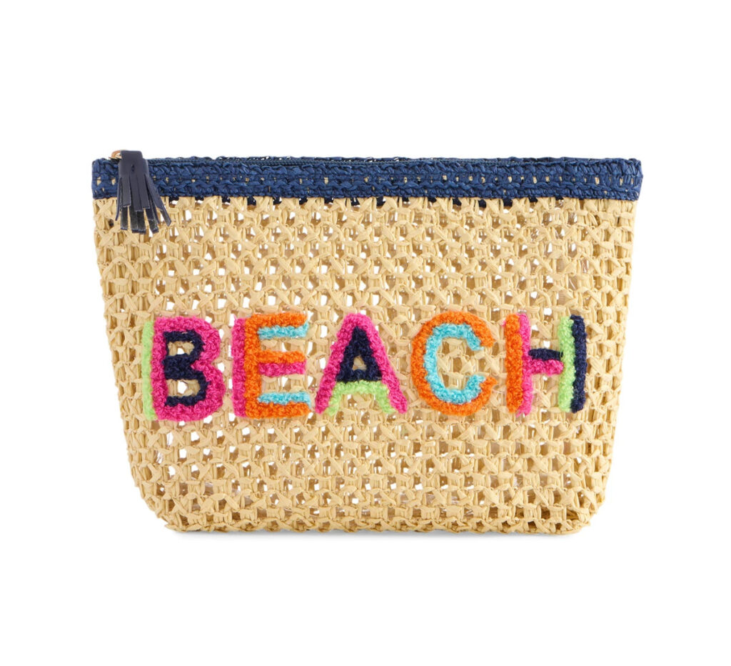 Shiraleah beach pouch filled with honeymoon travel essentials