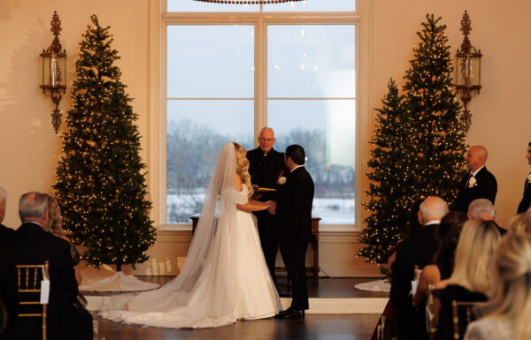 Carolers, Emerald Green Velvet & a First Look Under Snow-Covered Pines at The Park Savoy Estate