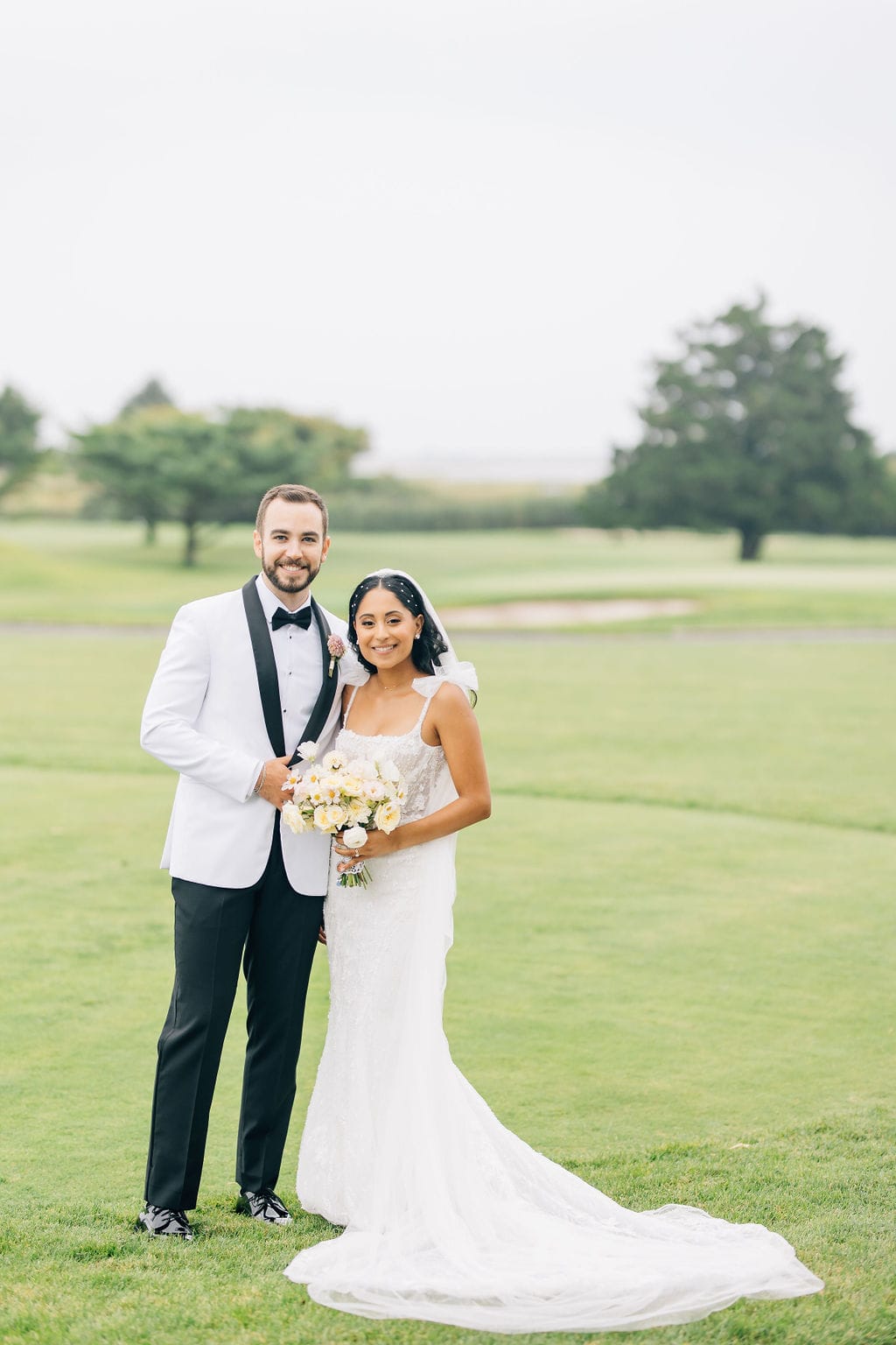 An elegant wedding at Linwood Country Club with a pastel palette.