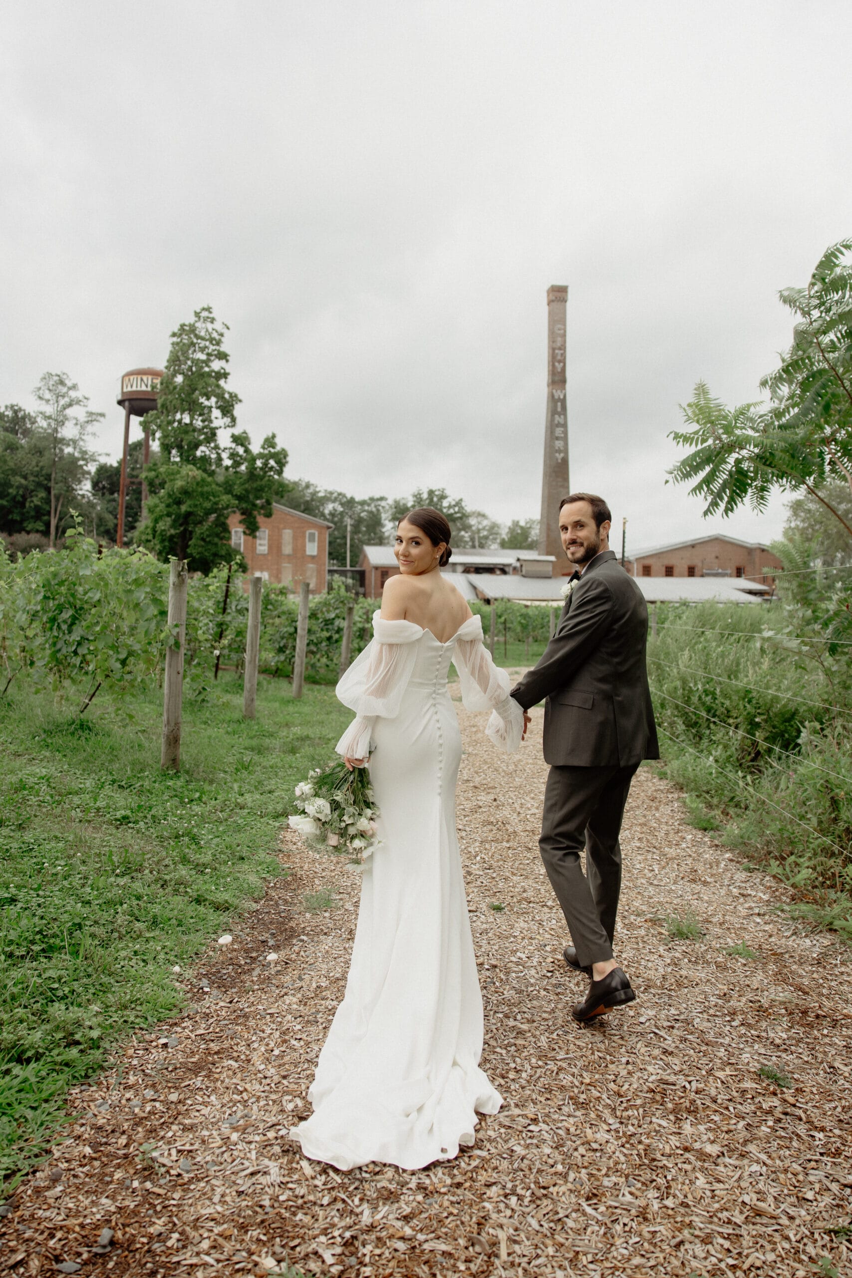 A wedding at City Winery Hudson Valley that leaned into the stunning vineyards and industrial aesthetic.