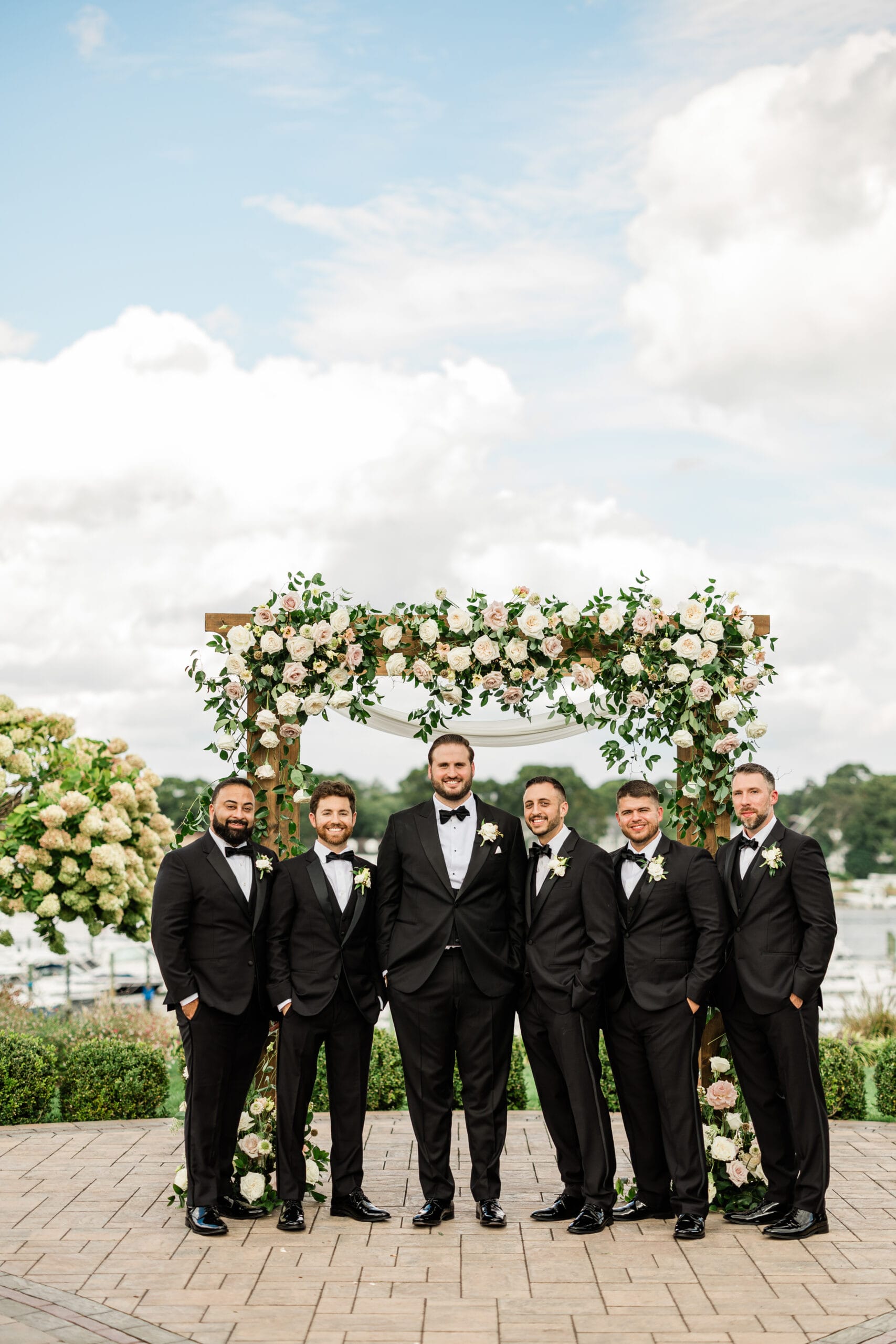 A pretty pink and white wedding at Crystal Point Yacht Club.