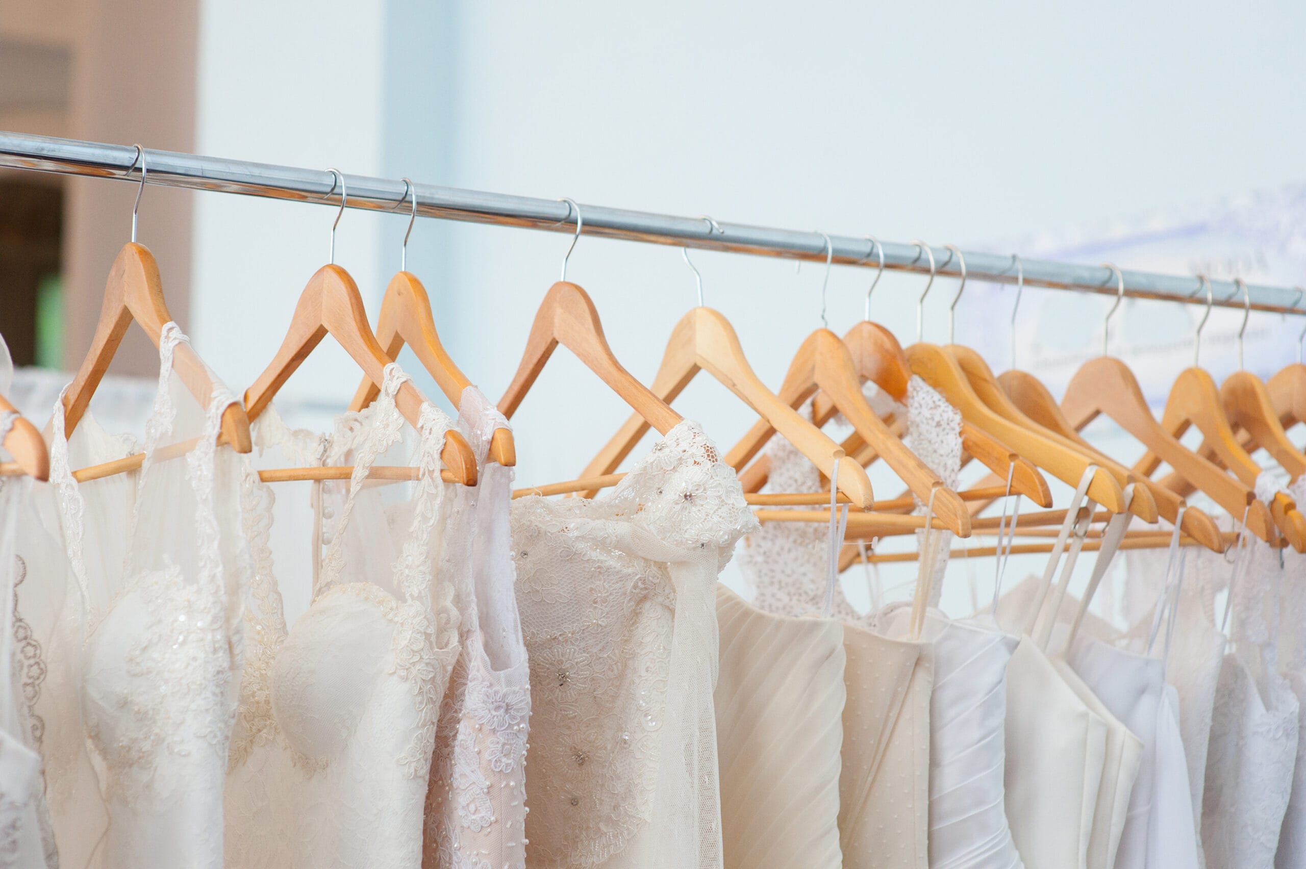 rack of wedding gowns